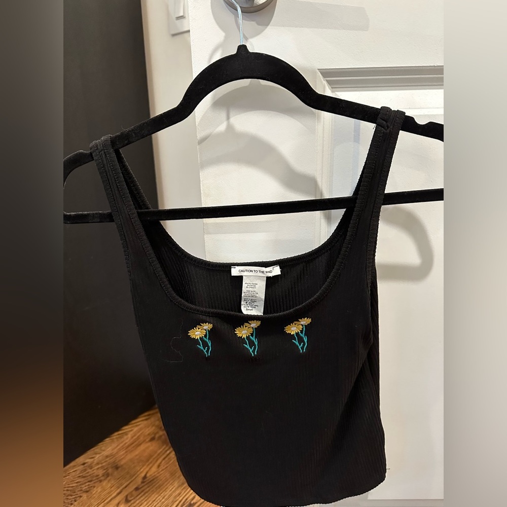 Black tank top with sunflowers on center